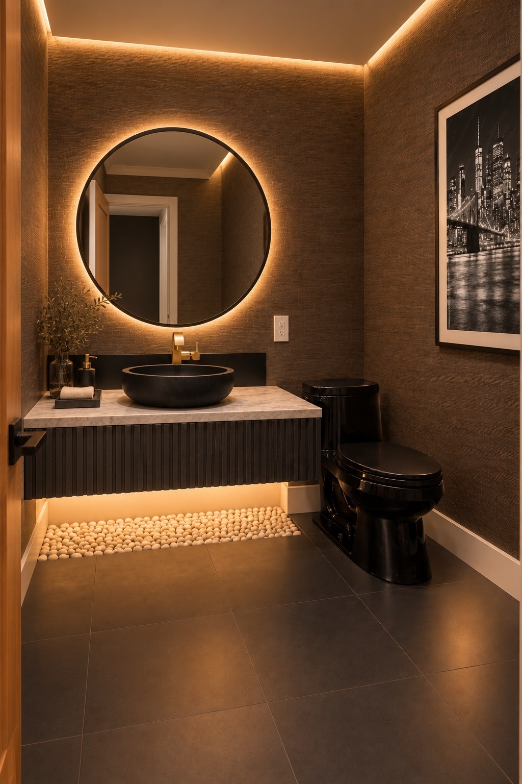 Powder room with warm lighting and a floating vanity