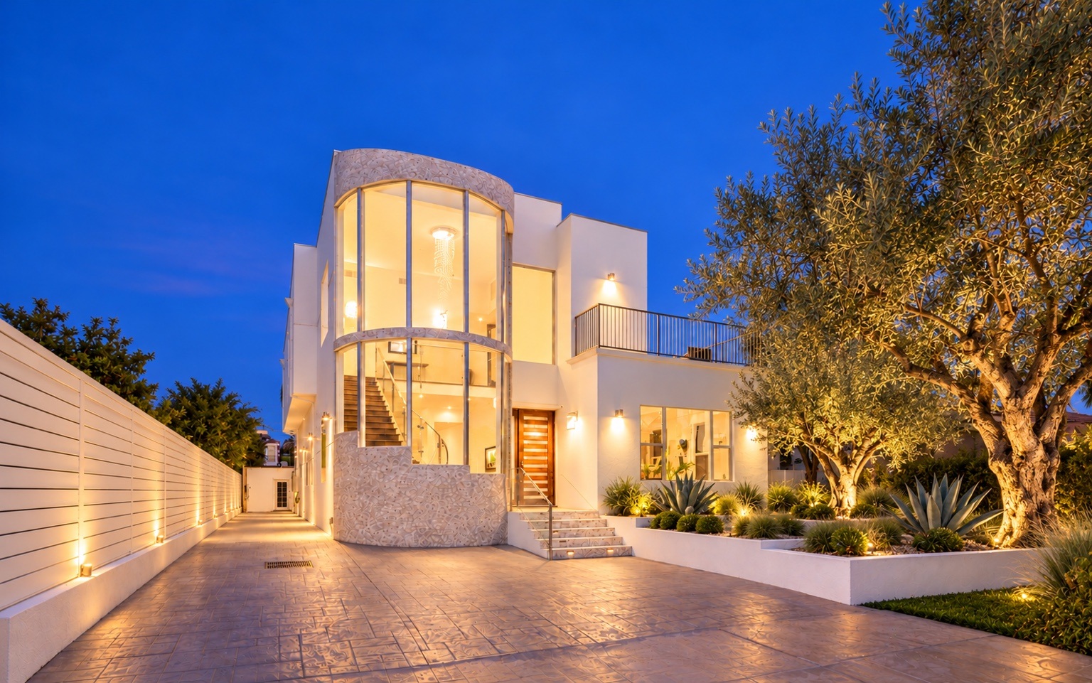 Beverlywood Residence illuminated exterior at dusk