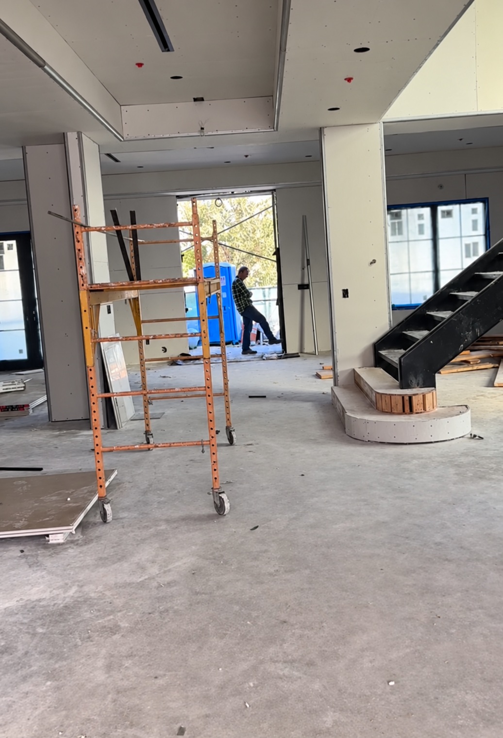 Interior drywall and staircase installation during construction