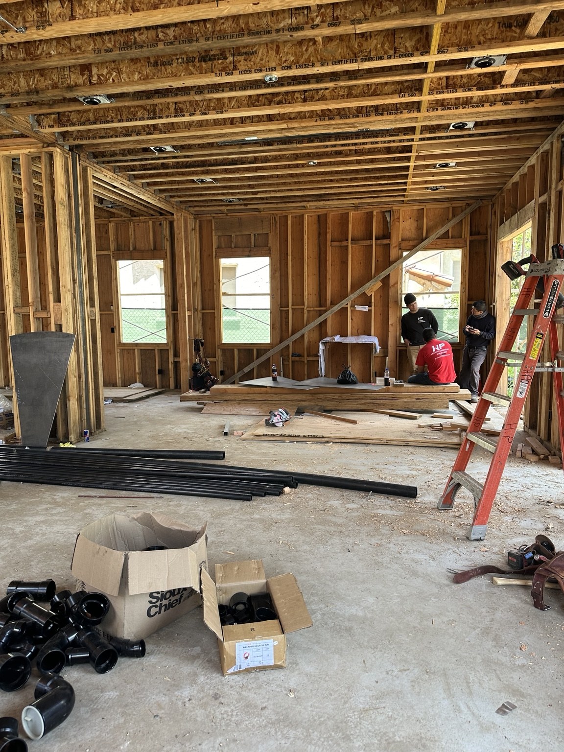 Interior framing and building services during construction