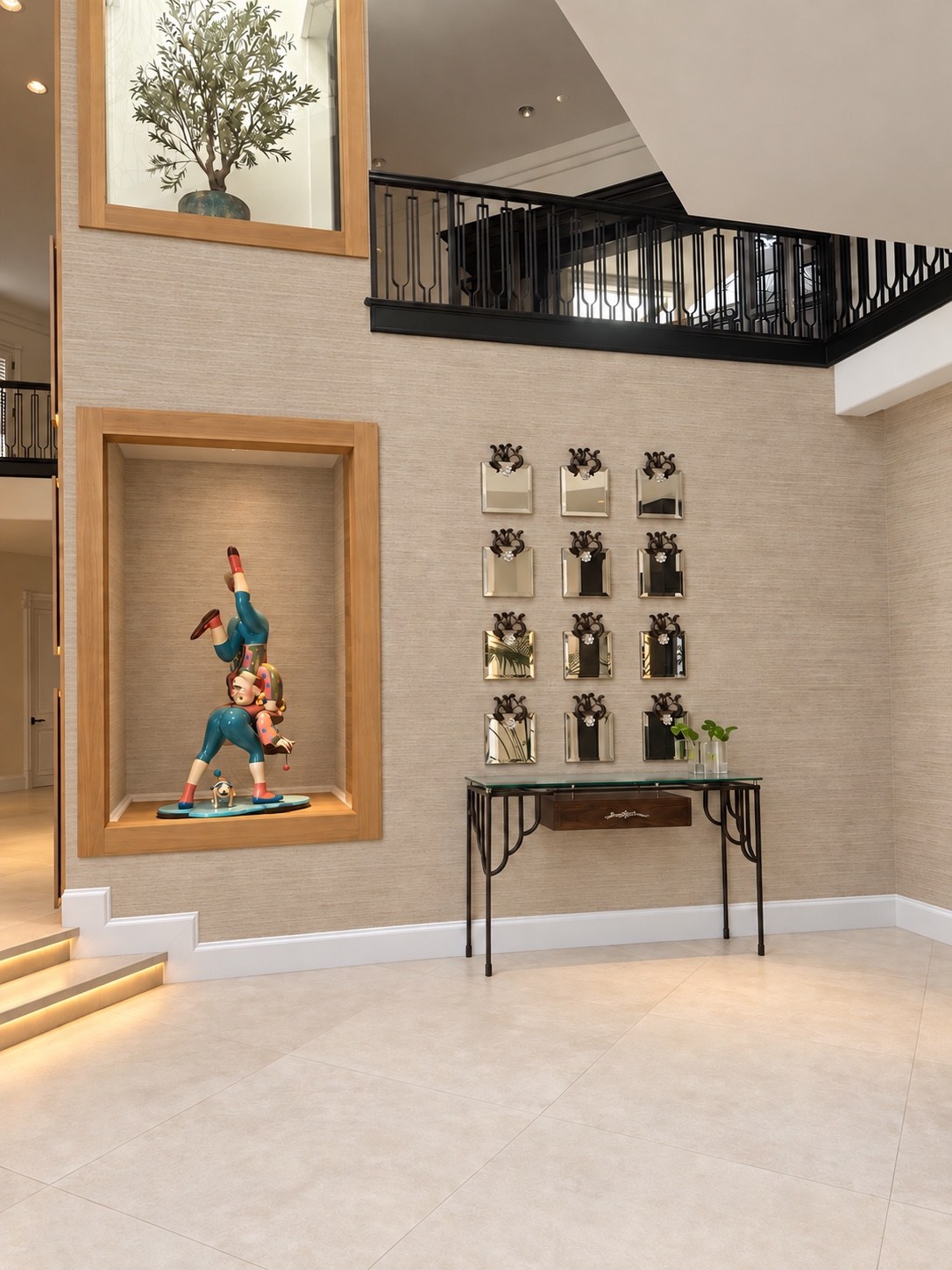 Foyer with sculptural display and upper-level railing
