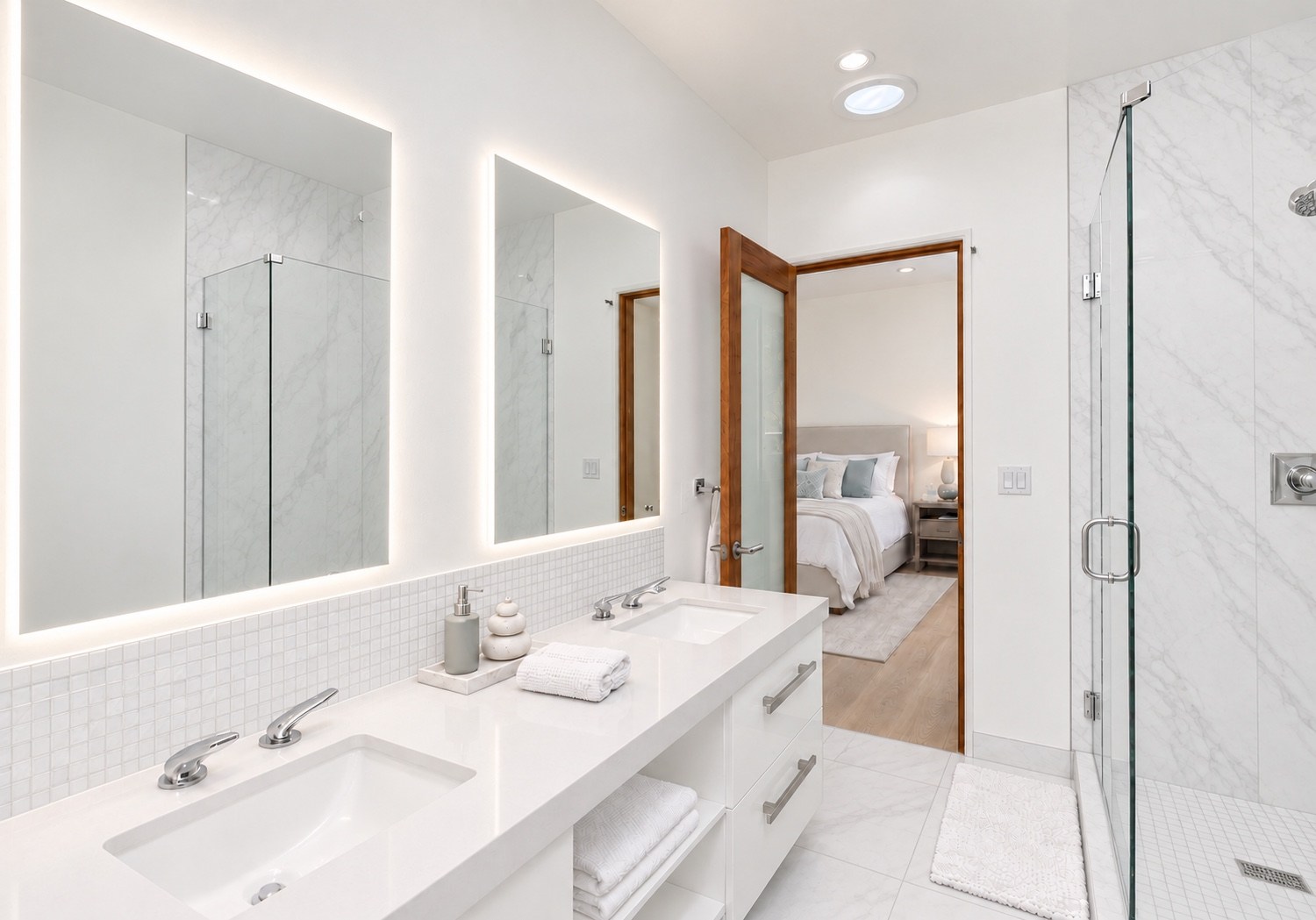 Bathroom vanity with illuminated mirrors